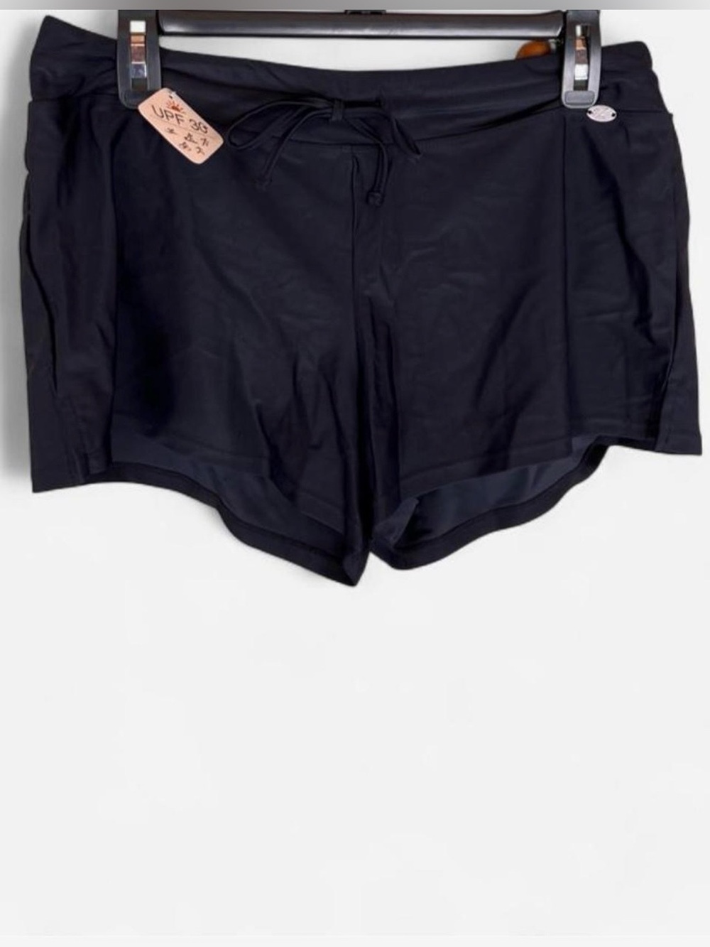ZEROXPOSUR Women’s Black Swim/Action Shorts with
UPF 30+ protection